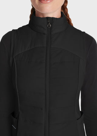 Healing Hands logo zipper pull. This flattering vest features quilted front and back panels